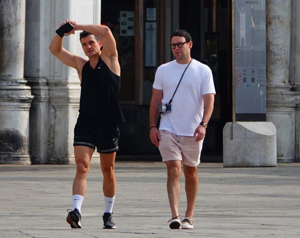 Orlando Bloom and Scooter Braun walking in Venice.