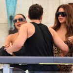 Kim and Khloe Kardashian with a man in Venice.